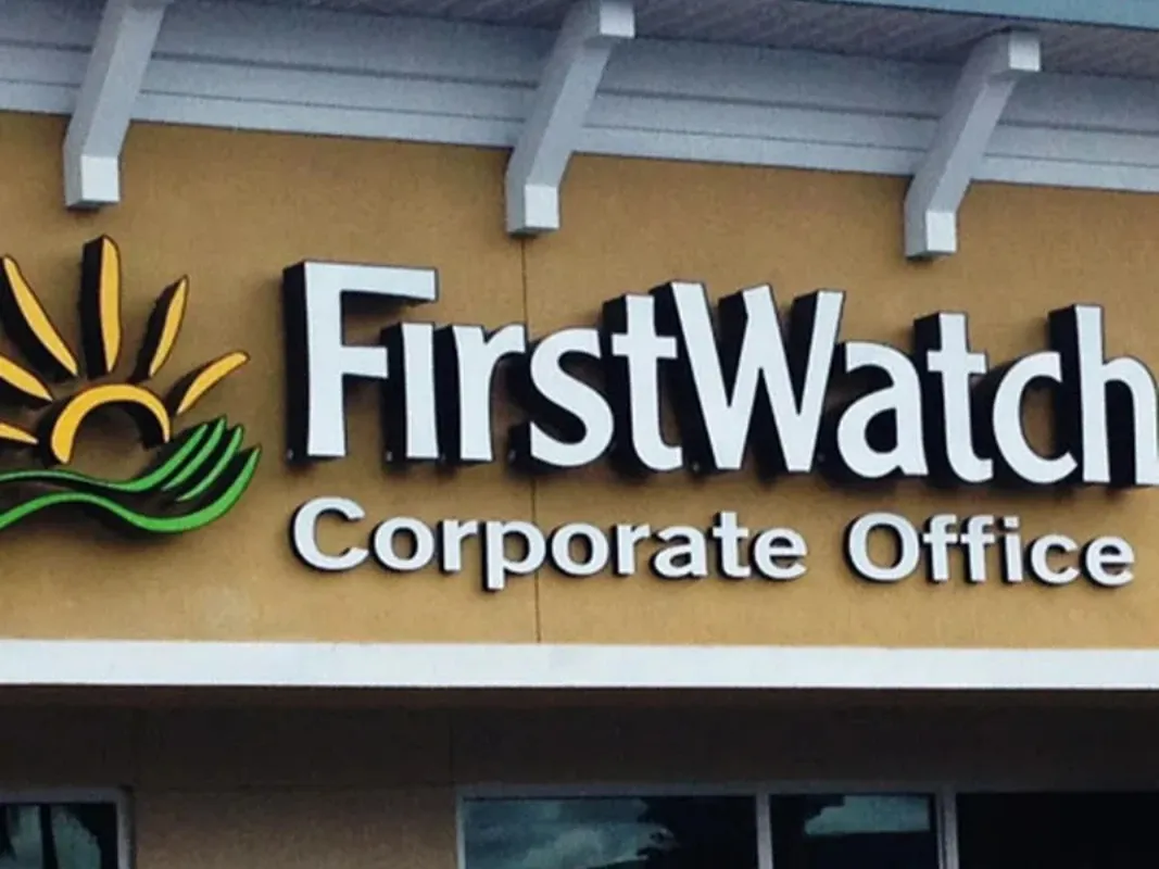 Corporate office storefront sign with logo