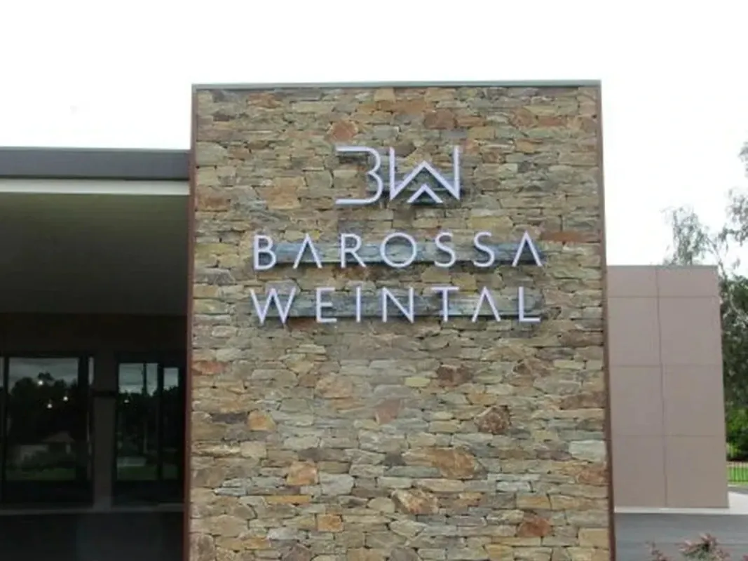 Stone wall halo lit dimensional letters