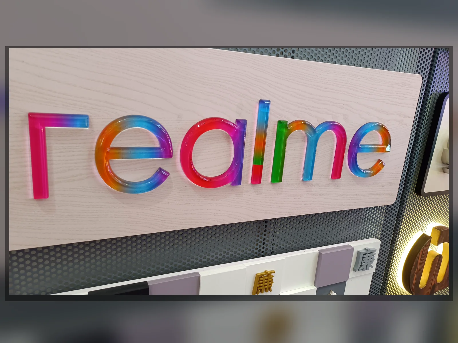 Dimensional brand logo letters