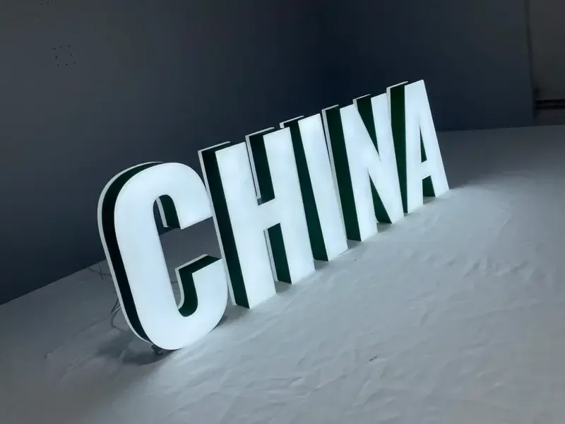 Dual lit channel letters for coffee shop storefront with warm glow