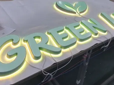 Dual illuminated channel letters on modern restaurant storefront