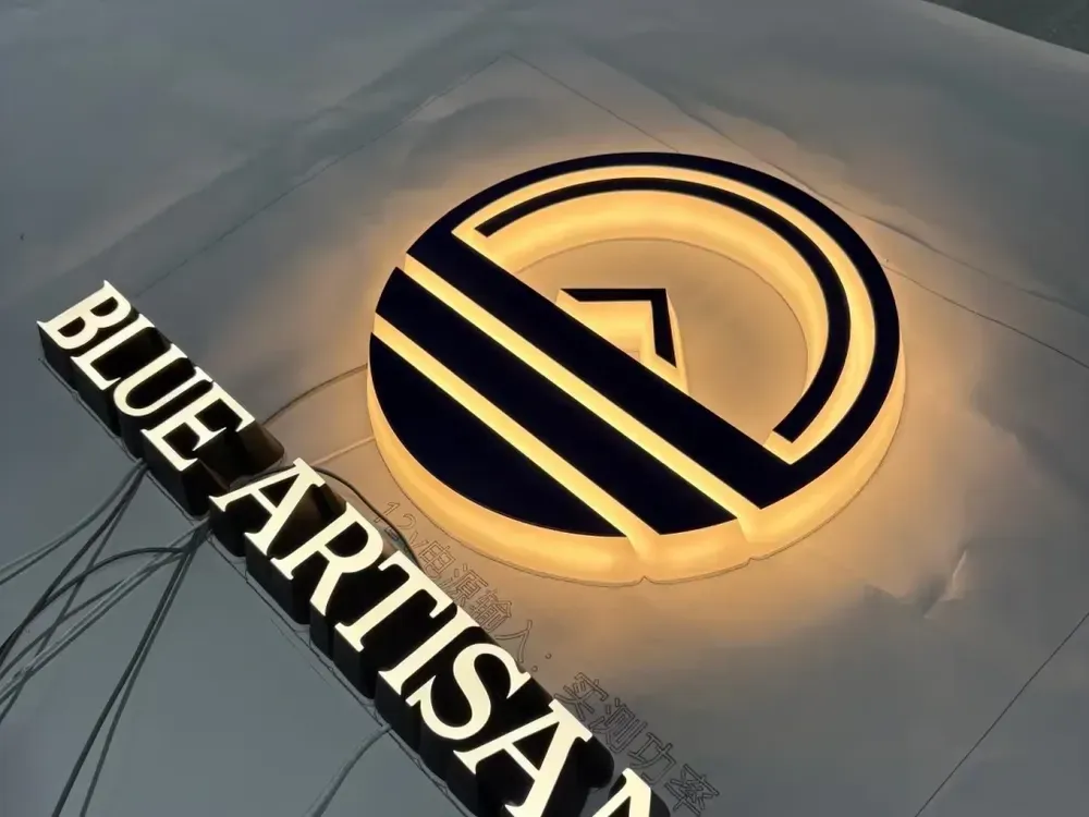 Black front lit mini channel letters with round logo