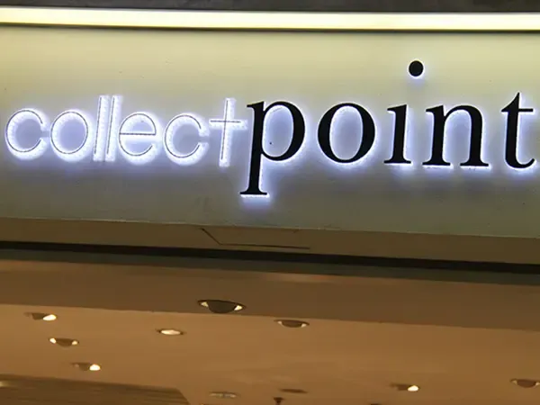 Large backlit dimensional letters on commercial building roofline