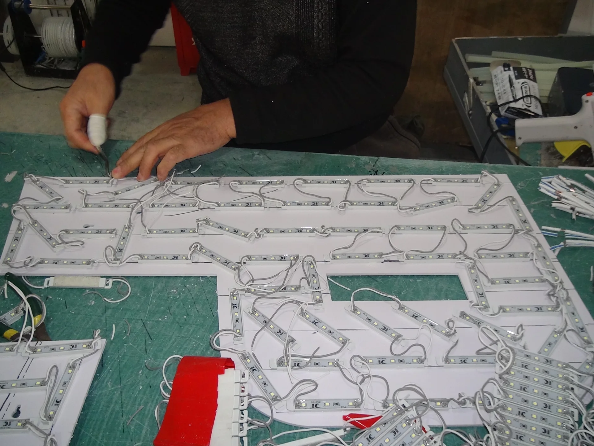 LED modules and wiring arranged inside a channel letter