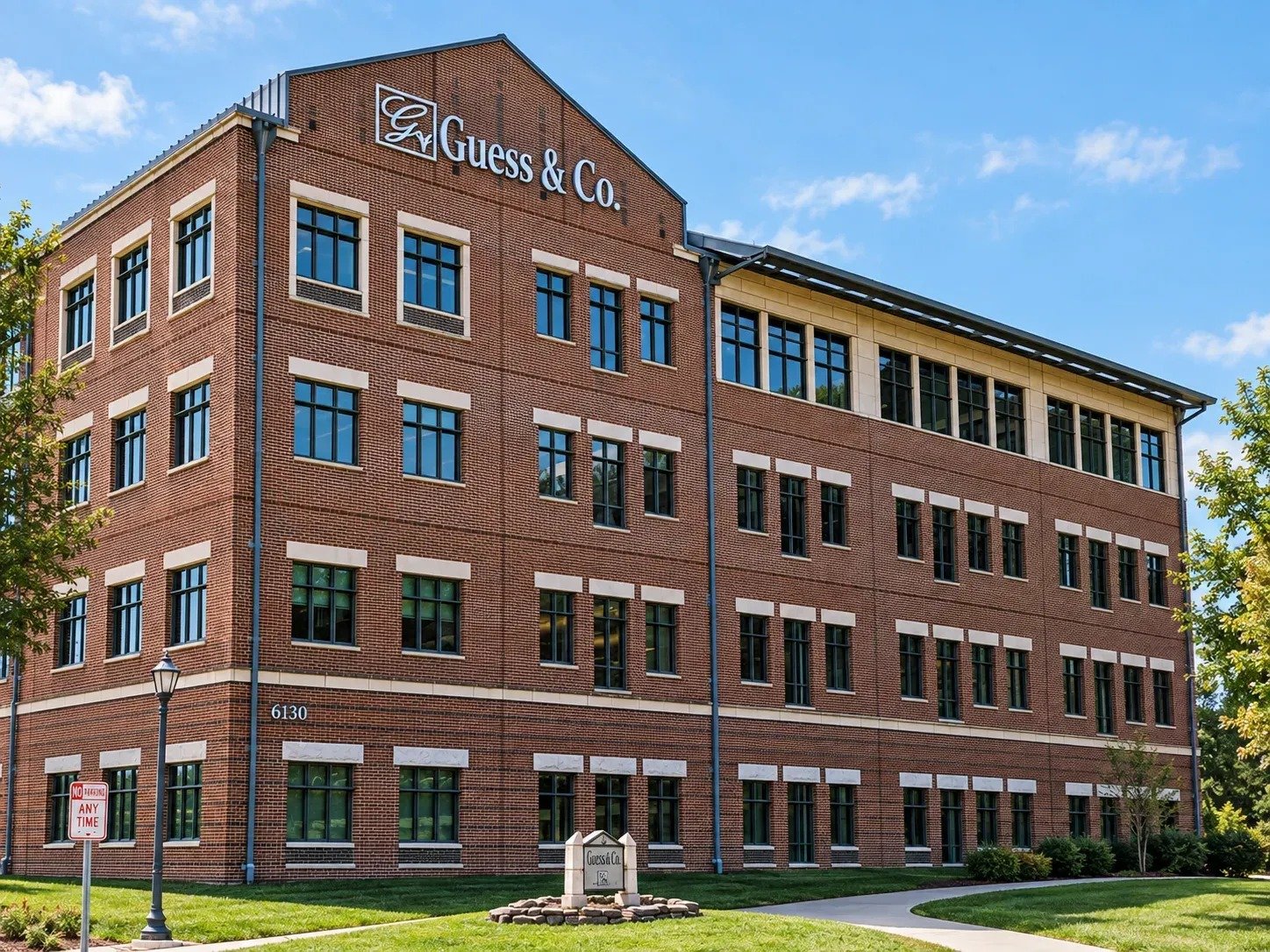 Exterior building signage installed on a multi-story commercial property