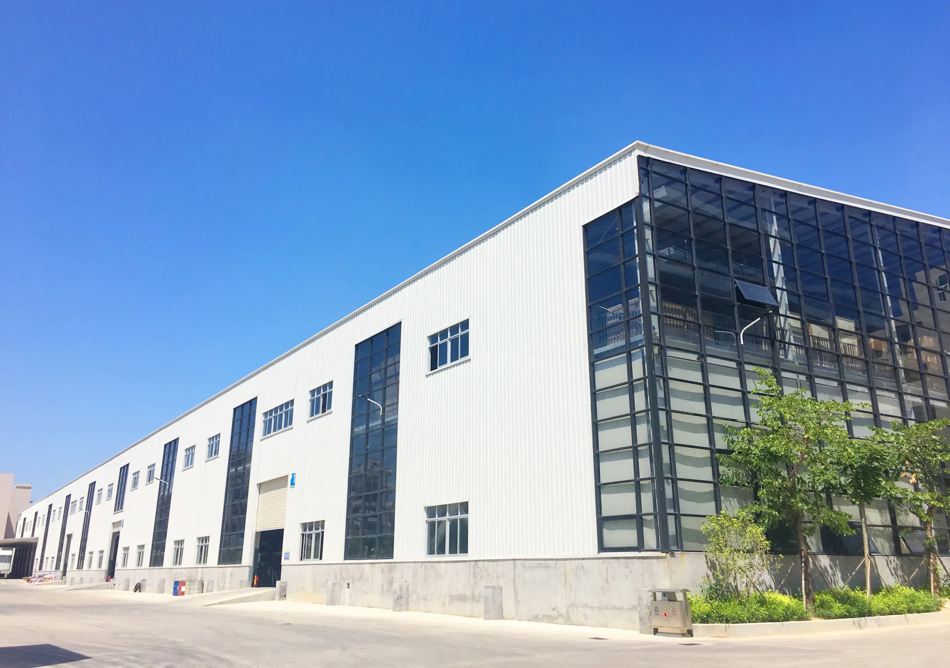 Metalworking workshop building and loading area