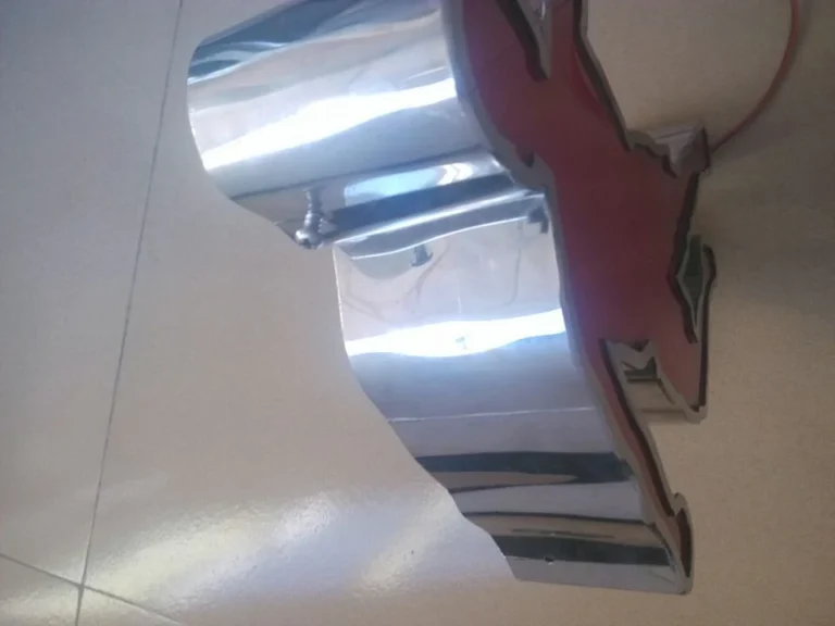 Side view of a shaped sign showing deep reflective returns beside its colored face.